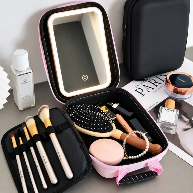 Organizador de maquillaje rosado con espejo LED, organizador portátil con compartimentos para brochas y cosméticos, foto 3 de 3